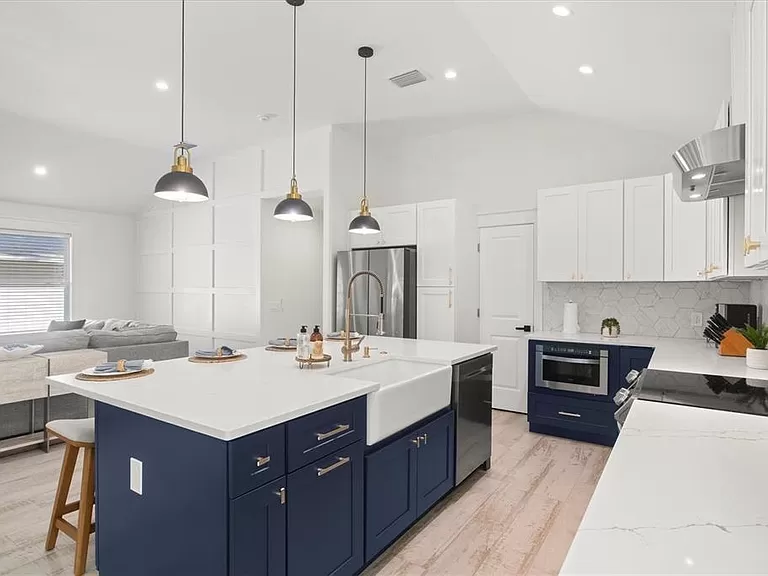 The navy and white kitchen