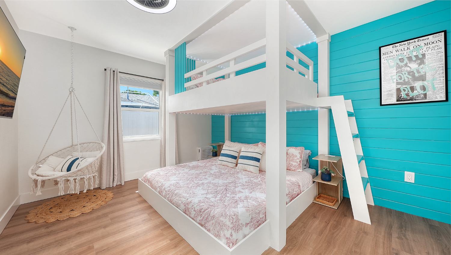 Bunk room with hanging chair