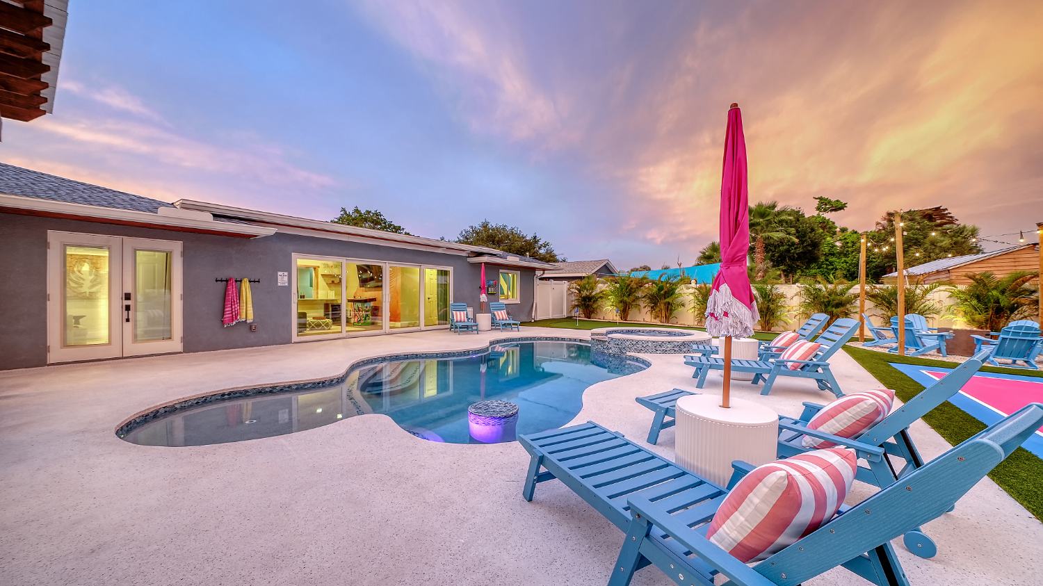 Sunset over the pool and house