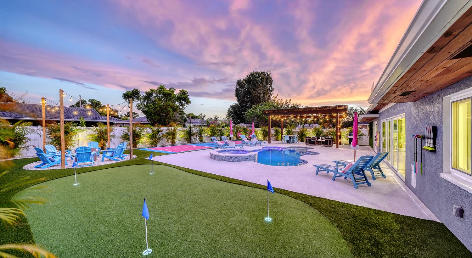 Putting green and fire pit at dusk
